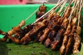 Sate indonesian skewer with a natural background. Sate is one of traditional Indonesian food which served with peanut sauce