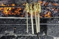 Sate Lilit Bali or wrapped sate is Traditional Balinese minced seafood satay is grilled on charcoal