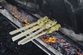 Sate Lilit Bali or wrapped sate is Traditional Balinese minced seafood satay is grilled on charcoal