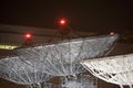 Satellite Communication Dishes at Night