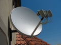 Satellite dish antenna over blue sky Royalty Free Stock Photo