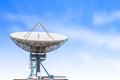 satellite dish antenna radar big size and blue sky grass background Royalty Free Stock Photo