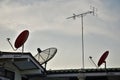 Satellite dish antenna on top roof Royalty Free Stock Photo