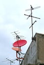 Satellite dish and attenna on a old building Royalty Free Stock Photo