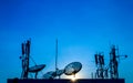 Satellite Dish and Communication Tower. Royalty Free Stock Photo