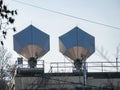 Satellite dish on the roof of the building against the blue sky Royalty Free Stock Photo