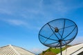 Satellite dish on the roof of country house. Royalty Free Stock Photo