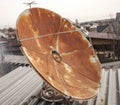 Satellite dish on the roof, rusty,