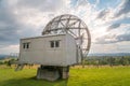 Satellite dish in a summer landscape, radiotelescope for deep space research. Ondrejov observatory, Czech republic. Royalty Free Stock Photo