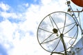 Satellite dish on top of the roof with blue sky background. Royalty Free Stock Photo
