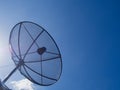 Satellite Dish Transmission Data On Bright Blue Sky Background. Royalty Free Stock Photo