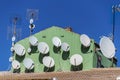 Satellite dishes on roofs Royalty Free Stock Photo