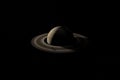 Satellite or moon orbiting over rings of planet Saturn. 3d render Royalty Free Stock Photo