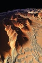 Satellite scan of a desert landscape with LiDAR GIS data visualizing elevation dunes and topographical features.