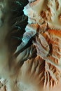 Satellite scan of a desert landscape rendered in 3D using GIS and LiDAR data with color-coded dunes and topographical elevation.