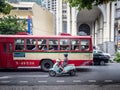 Sathorn, Bangkok, Thailand, Southeast Asia - Rush hour in downtown. Citizens in a fare free public bus.