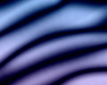 Satin abstract background with silk blue purple waves