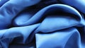 Satin elegant blue drape with flowing texture