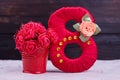 Satin red number, artificial flowers