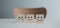 Satisfaction survey with negative, neutral and positive facial expressions on wooden cube.. Royalty Free Stock Photo