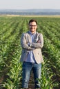 Famer with crossed arms in corn field Royalty Free Stock Photo