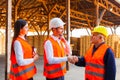 Satisfied customers are thankful to foreman after project fulfilment Royalty Free Stock Photo