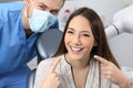 Satisfied dentist patient showing her perfect smile Royalty Free Stock Photo