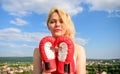 Satisfied free girl boxing gloves. Femininity and strength balance. She fighter female rights. Assert her point of view