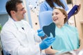 Satisfied girl and dentist in dental ambulance smiling Royalty Free Stock Photo