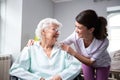 Satisfied and happy senior woman patient with nurse Royalty Free Stock Photo