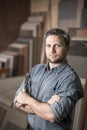 Satisfied joinery worker holding chisel Royalty Free Stock Photo