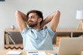 Satisfied student, businessman relaxing leaning back after finish work Royalty Free Stock Photo