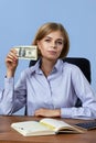 satisfied successful blonde business woman holding money Royalty Free Stock Photo