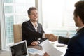 Smiling company leader handshaking with partner Royalty Free Stock Photo