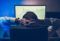 Satisfied Trader Looking at Stock Market Graphs