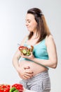 Woman eats a delicious vegetable salad Royalty Free Stock Photo