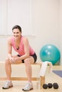 Satisfied woman resting on bench Royalty Free Stock Photo