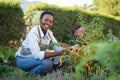 Satisfied woman working at vegetable garden Royalty Free Stock Photo