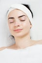 Satisfied young woman with closed eyes portrait in Royalty Free Stock Photo