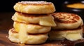 Satisfy your cravings with a stack of cheesy English muffins