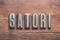 Satori letters wood