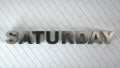 SATURDAY - Realistic Metal Sign on White Wooden Floor. 3D illustration