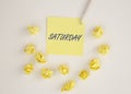 SATURDAY word on yellow reminder note, concept inscription Royalty Free Stock Photo