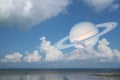 Saturn back cloud sky on sea ,concept Saturn near Earth