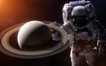 Saturn on a blurred background with a giant astronaut. Elements of the image are furnished by NASA Royalty Free Stock Photo