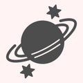 Saturn glyph icon. Planet with rings and stars around. Astronomy vector design concept, solid style pictogram on white Royalty Free Stock Photo