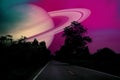 Saturn near earth on night sky over the country road