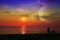 Saturn near earth on night sky over the sea and sunset