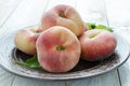 Saturn peaches or UFO, donut, flat peaches Royalty Free Stock Photo