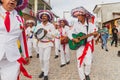 Cultural demonstration called Encontro de Chegancas in Saubara, Bahia. Members of a Marujada wear white clothes with colors and